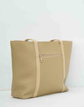 Beige woven tote bag with leather trim and exterior zipper pocket