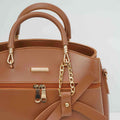 Brown leather handbag with gold chain accents and double handles